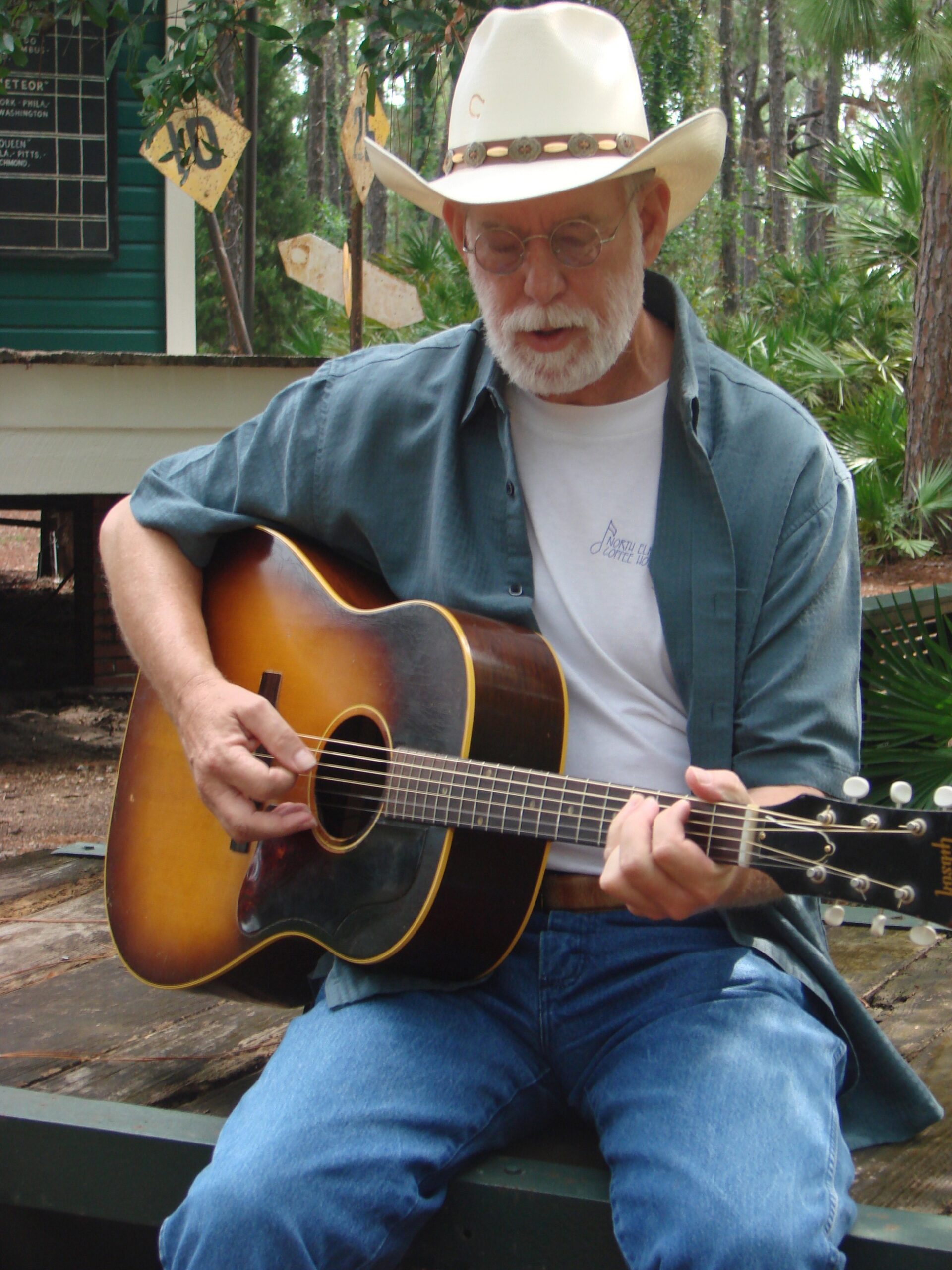 Rob Northrop playing guitar on stage