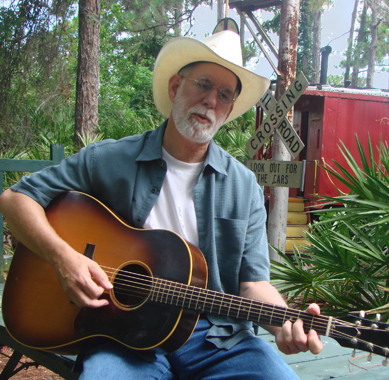 Rob Northrop with acoustic guitar